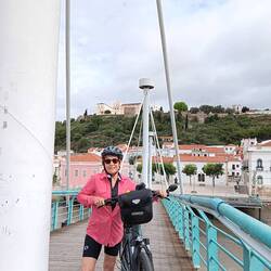 Pedestrian bridge with the Pousada on the hill