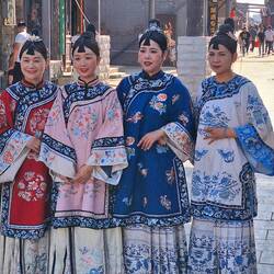 Likely to be tourists who like to dress up