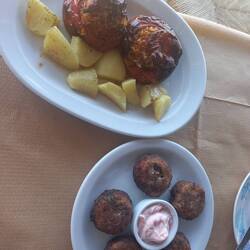 Octopus croquettes and roasted stuffed tomatoes, for starters