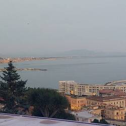 Night time first night after dinner in town from a street Cafe of a dish called Pokē