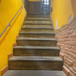 Why are all bathrooms down stairs in Italy?