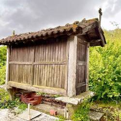 In the Glacia region, a lot of homes have these raised grain storage bins.