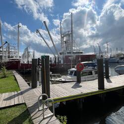C-Traveler docked at one of the two Oriental free docks. Shrimp boats in the background.