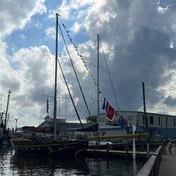Colorful sailboat on the other free dock in Oriental.