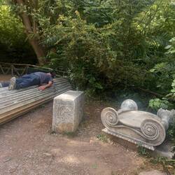 It is that guy lying around again! This time on a Greek Column.