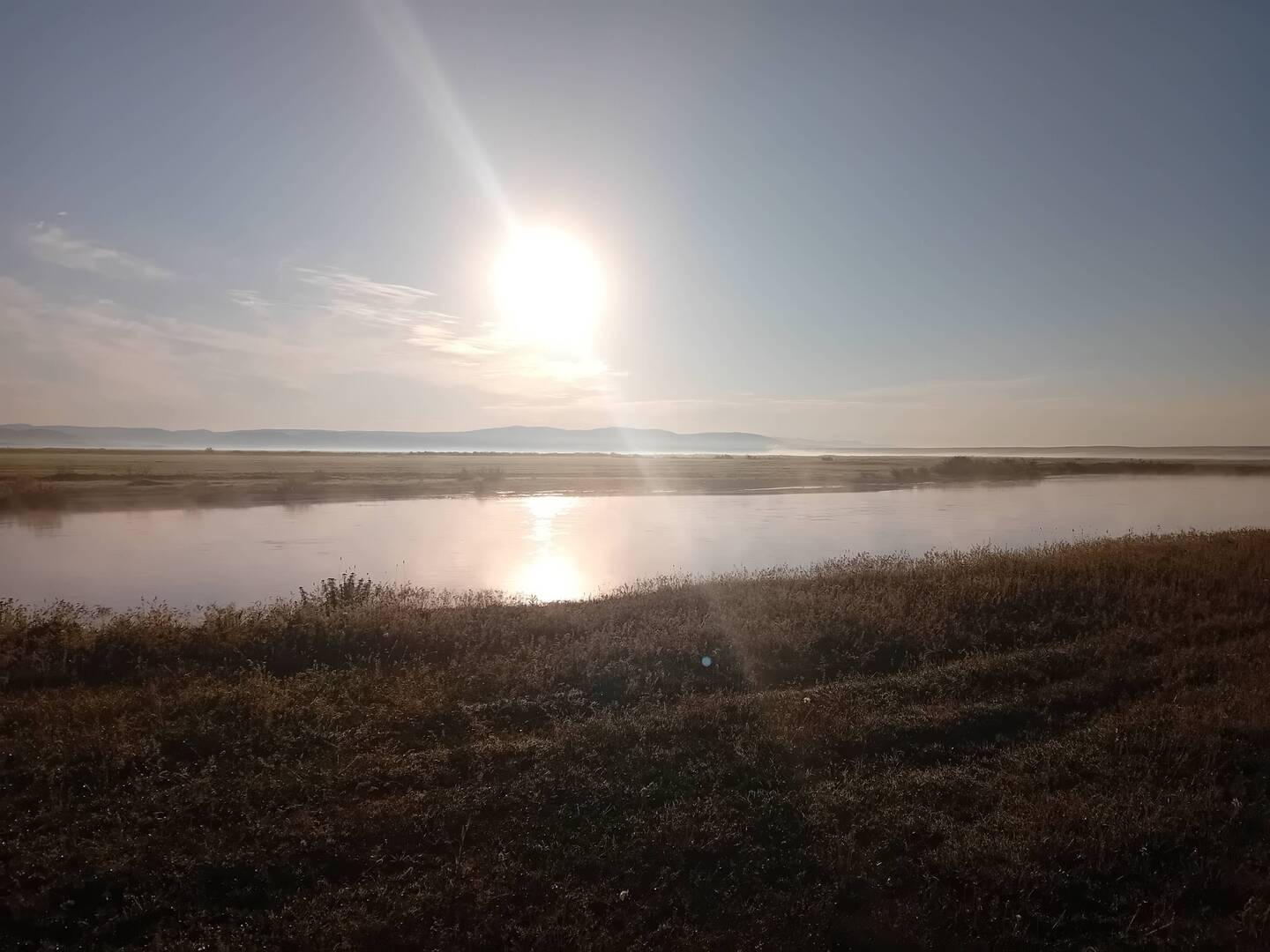Sunrise on Euphrates. It is cold and the river is steaming.