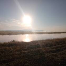 Sunrise on Euphrates. It is cold and the river is steaming.