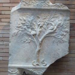 Plaster relief of tree with birds and serpent. 1st c AD