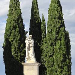 Statue stands over the church square