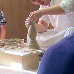 Spinning a sake jar.