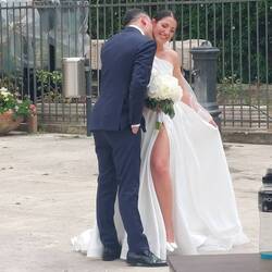 Wedding party having pics taken on the grounds