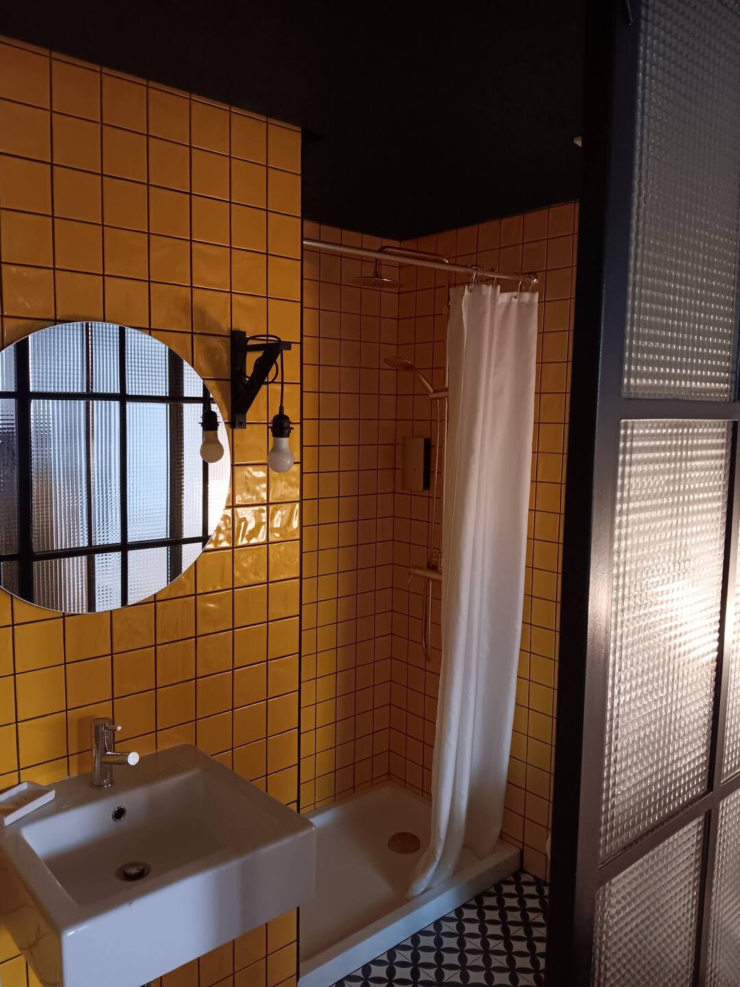 Bright yellow tile in our room at the Lemon Tree BnB
