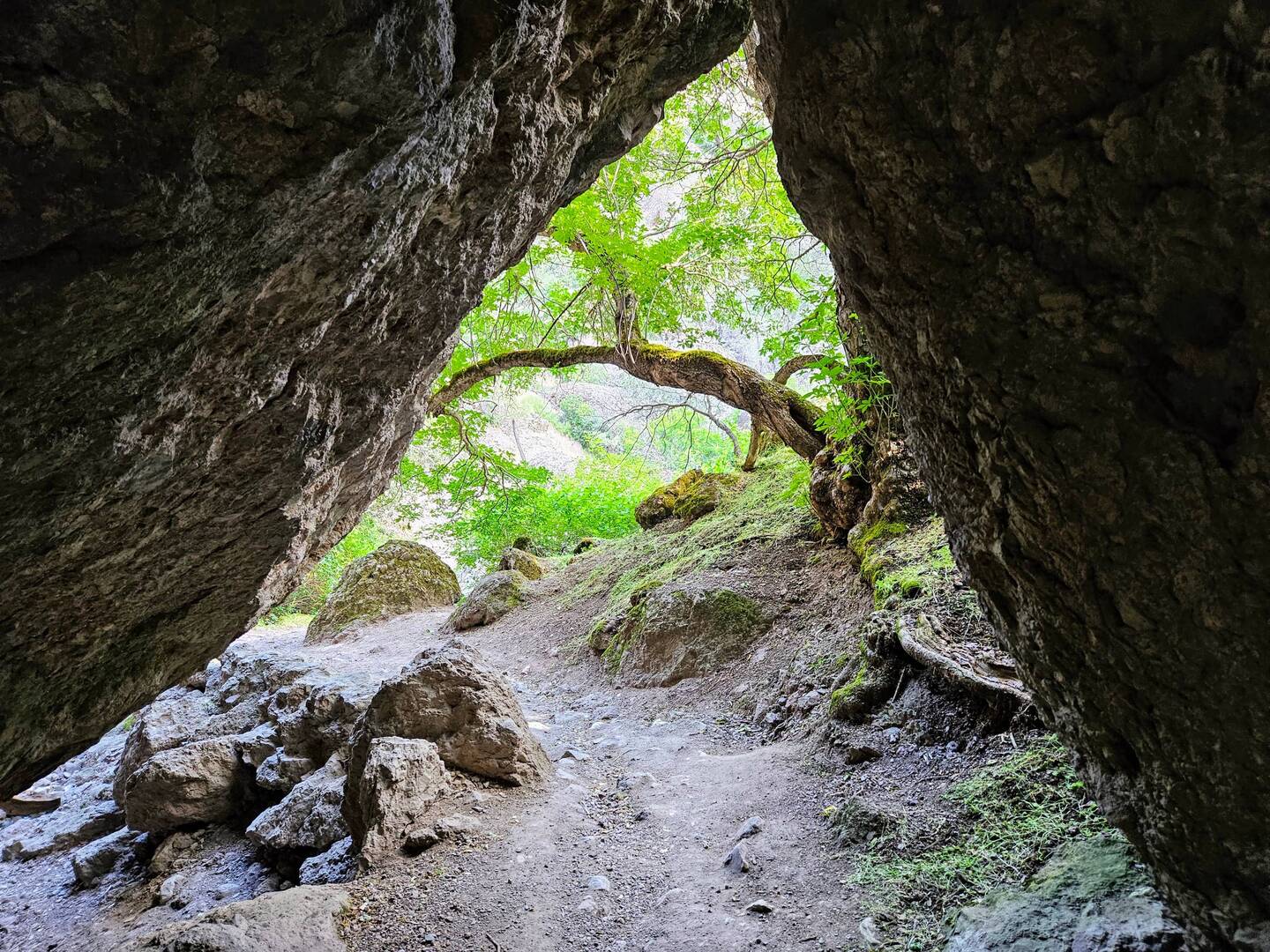 Exiting a smaller talus cave earlier on the trail