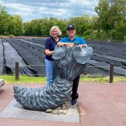 With a sculpture of a wasabi plant.