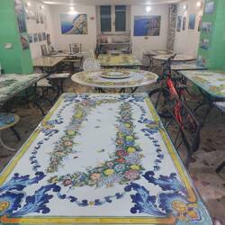 Amazing ceramic table tops We purchased some art from here