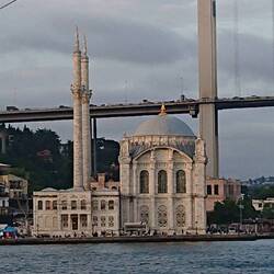 An elegant old Mosque by the new bridge over The Bosphorus