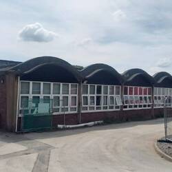 Luckily the contractors hadn't got round to knocking down the memorable wavy roofed building yet.