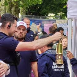 The flame is transferred again for safe keeping overnight