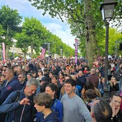 Huge crowd turned out in the rain, which cleared just before the flame reached its stop
