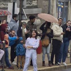 Waiting to relay the flame as it gets closer