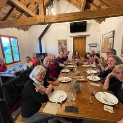 Communal dinner at Borda with a warm pot belly stove!