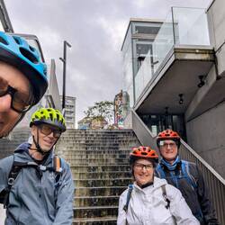 Start of our day carrying our bikes down the stairs to find the gps path