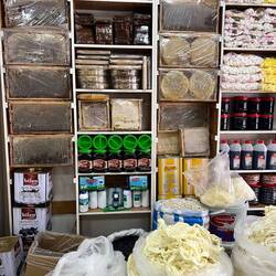 The cheese and honey shop. String cheese in the sacks below.