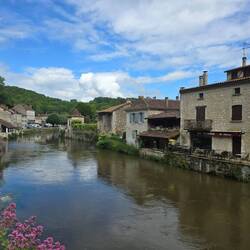 The river Dronne with views up the river Dronne with town on the opposite bank