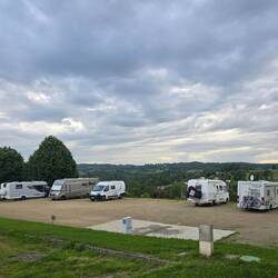 Motorhome aire and parkup for the night. Free, with all the services. Great views over the valley