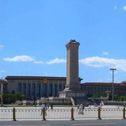 Tiananmen Square with the yellow roofs of the Forbidden City on the right