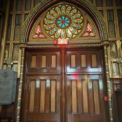 A beautiful door with rose window.