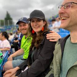 Ben and Margot, with Matt, at the baseball game