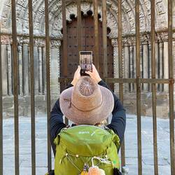 Karen snapping me, snapping the cathedral gates