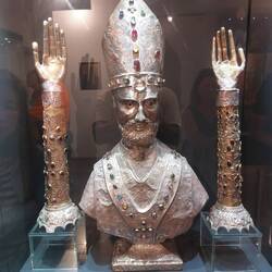 Church wealth is very prominent as displayed by the silver metalwork adorned with precious gems