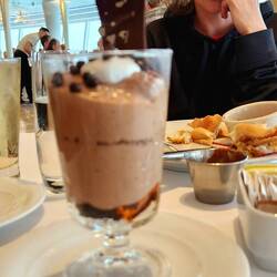 Laura is longingly looking at my chocolate mousse