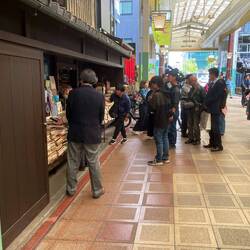 TV film crew waiting for a 'personality' to come out of the bookshop.