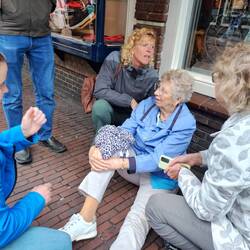 This poor lady fell and couldn't walk. 4 people and I stopped to help. I got her ice for her knee.