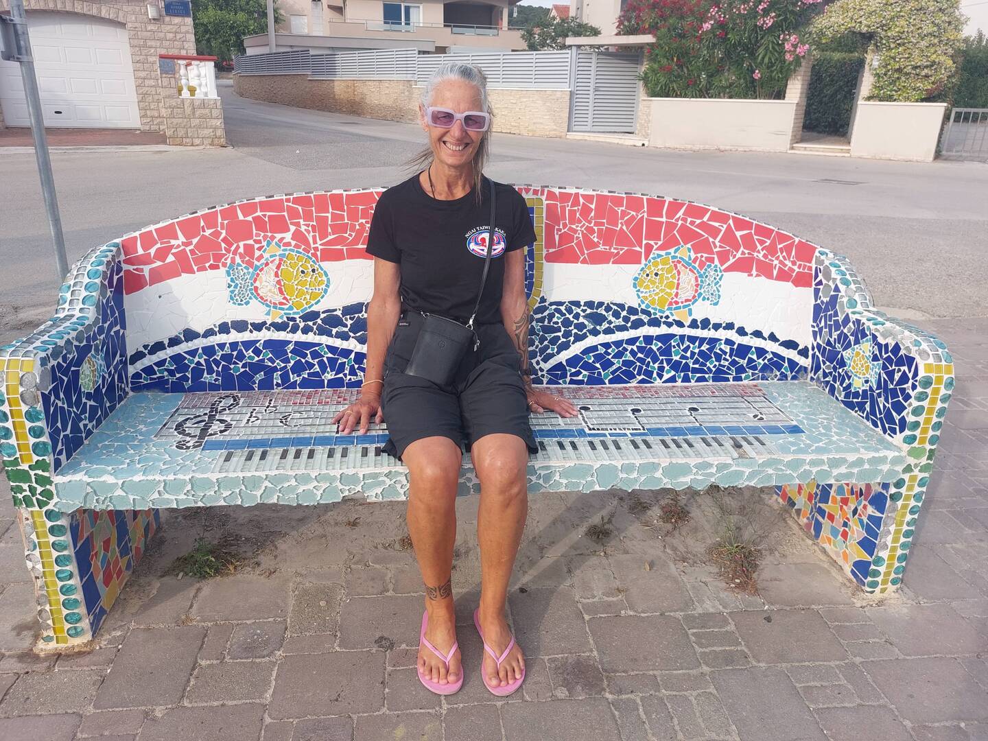 This lovely mosaic tiled bench seat is sitting on the waterfront