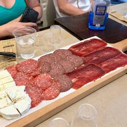 Local cheeses, salami and a meat akin to prosciutto). Unique, mild in flavors and delish!