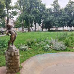 Found this fountain a right hoot. Boy peeing in a pond.