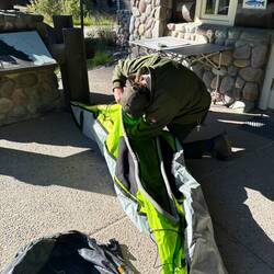 The ranger at Polebridge inspecting my kayak for invasive species! Very thorough.