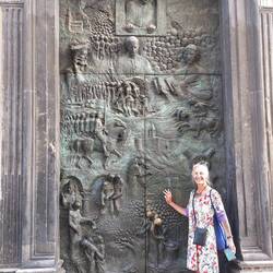The brass lined door was created in memory of Pope John Paul II, depicted at the very top