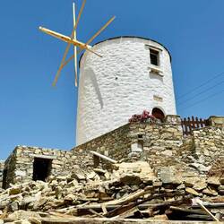 The first windmills of Greece were built in the 12th century.This is not original, but good example.