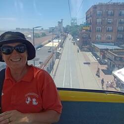 Riding the telegondola, vacant streets below