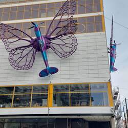 This old spitfire planes repurposed as art work on the dacade of this building