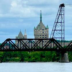 SUNY admin building behind the rail bridge (Albany)