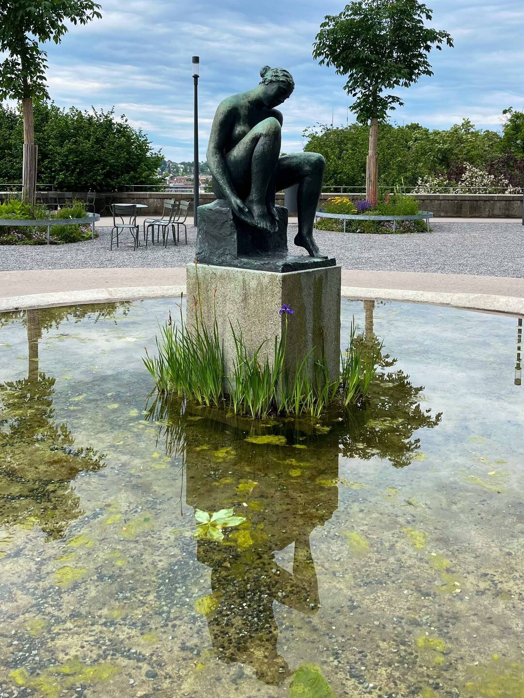 Statue in front of Swiss Parliament. I liked the single Iris at her feet