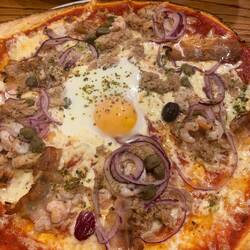 Egg sunny side up and runny. It's the thing!