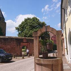 St. Sebastian's Chapel, the city wall and an ancient well