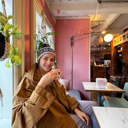 Ally trying to warm up with some hot chocolate